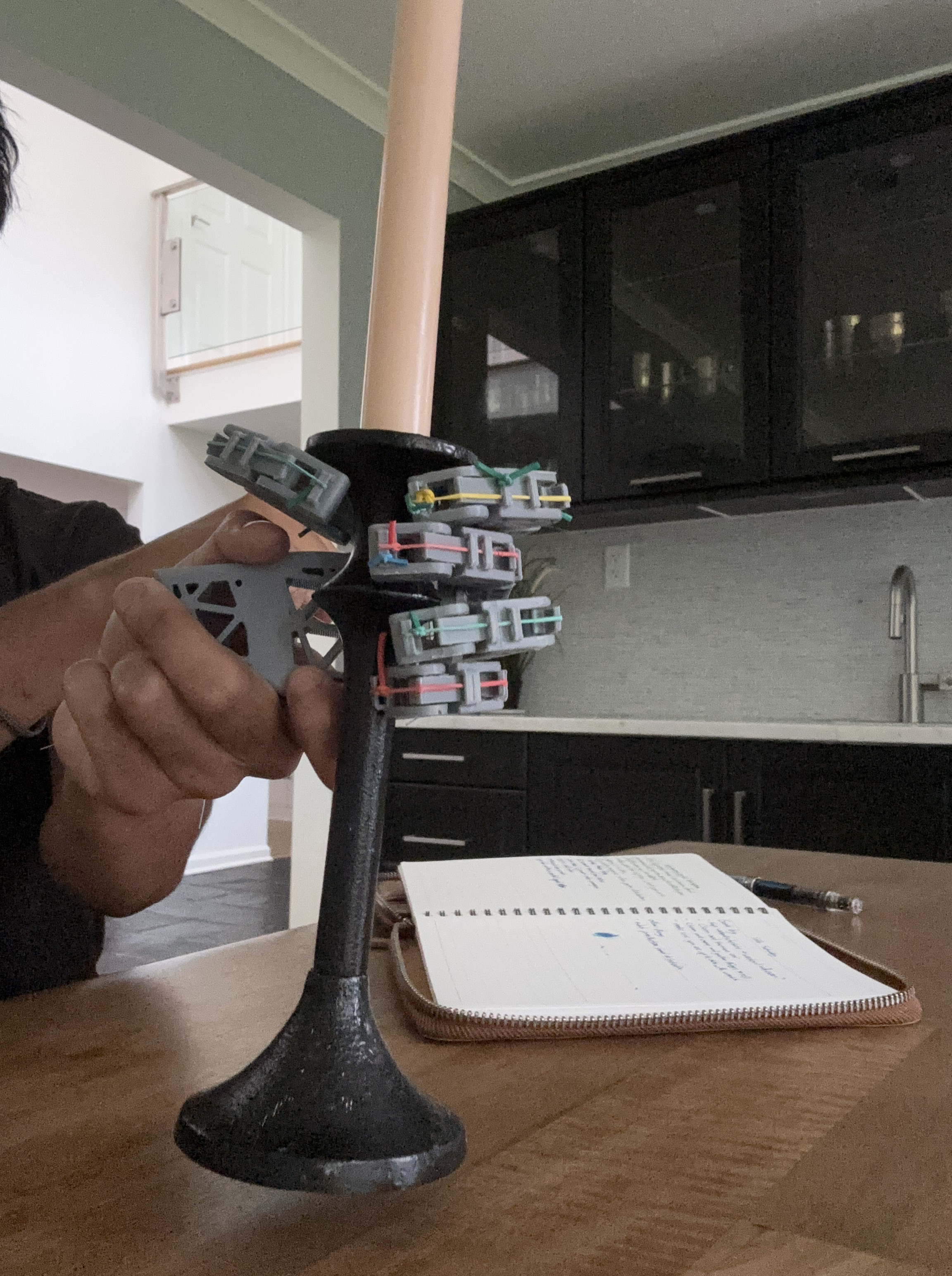 3D-printed prosthetic hand holding a candle